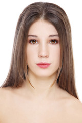 Fototapeta premium Portrait of young beautiful girl with long hair and clean makeup