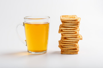 Mug of green tea and wheat cookies on a light background. Breakfast Cookies. Close up