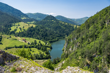 Aerial view of the mountain lake in the valley