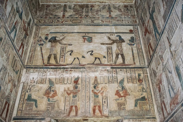Fototapeta na wymiar Ancient Egyptian hieroglyphics and wall drawings at Dendera temple, Luxor, Egypt.