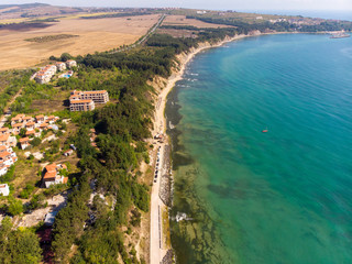 Aerial photo of the beautiful small town and seaside resort known as Obzor in Bulgaria showing the coastal hotels and people relaxing and having fun on the golden sunny beach of the Black Sea coast