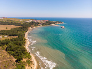 Fototapeta na wymiar Aerial photo of the beautiful small town and seaside resort of known as Obzor in Bulgaria taken with a drone on a bright sunny day showing the beach and ocean sea front.