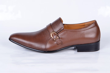An isolated Brown executive shoe