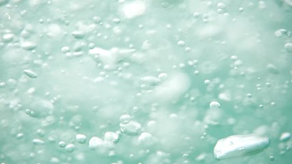 Bubbles rising to the surface. Air bubbles in water in sea (underwater shot), good for backgrounds. Slow motion.