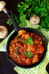 Beef stew with mushrooms in tomato sauce