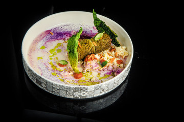 top view on finely decorated steamed cabbage rolls with rice and meat