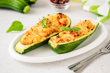 Stuffed zucchini boats. Selective focus, space for text.