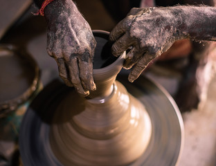 Clay Pots on Pottery Wheel