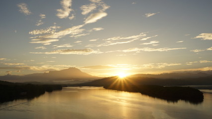 Mount Kinabalu during sunrise over Sulaman River Bridge