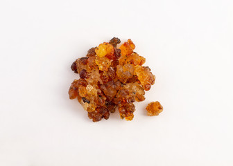 a group of peach gum on white background