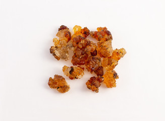 a group of peach gum on white background