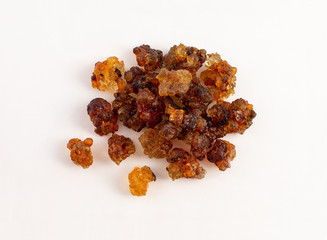 a group of peach gum on white background