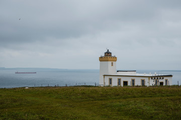 Fototapeta na wymiar Duncansby Head (Scotland) in a wet day