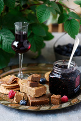 Norwegian cheese brunost on the cutting board. selective focus