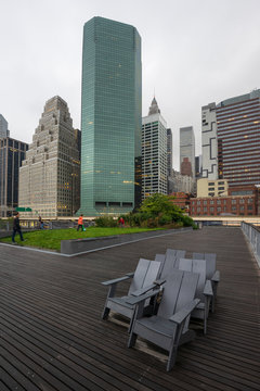Rainy and abandoned chairs in autumn on Pier 15, East River Esplanade