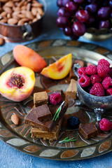 Norwegian cheese brunost on the cutting board. selective focus