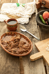 Delicious and typical Mexican breakfast. Delicious plate of birria	