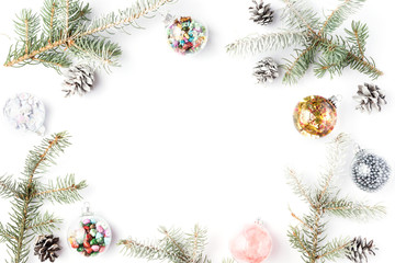 Fototapeta na wymiar Christmas decorations. Christmas, winter, new year concept. Fir tree branches, pine cones, xmas balls and decorations on white background. Flat lay, top view, copy space