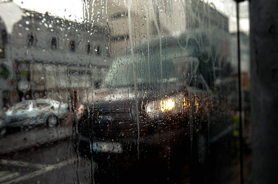 car under the sorrow rain
