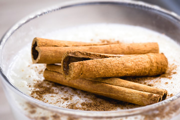 Sweet rice, also known as function rice and milk rice, is a dish made from rice cooked in milk and sugar, seasoned with lemon peel, cinnamon sticks and in general sprinkled with cinnamon.
