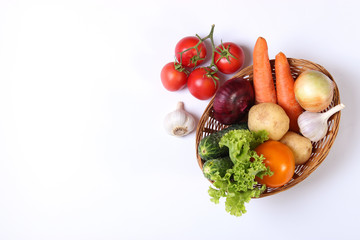 Set of different fresh vegetables on a white background top view.