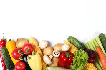 Set of different fresh vegetables on a white background top view.