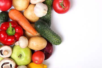 Set of different fresh vegetables on a white background top view.