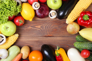 vegetables on a colored background top view. Place to insert text