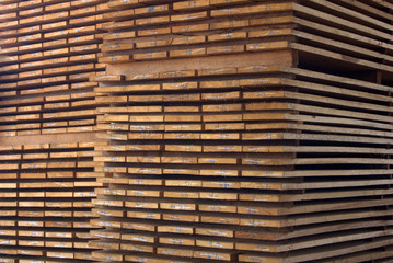 Stacks of packed lumber (boards) ready for sale to the final consumer