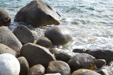 Wet stones on the beach