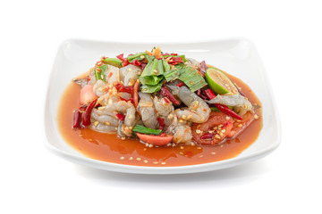 Thai Style spicy seafood salad with shrimps isolated on the white background with clipping path.