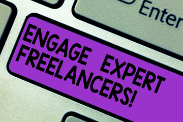 Conceptual hand writing showing Engage Expert Freelancers. Business photo text Hiring skilled contractors for a short time work Keyboard key Intention to create computer message idea