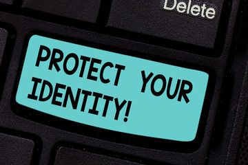 Conceptual hand writing showing Protect Your Identity. Business photo showcasing enabling privacy on your social media accounts Keyboard key Intention to create computer message idea