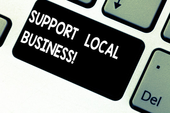 Conceptual hand writing showing Support Local Business. Business photo showcasing Shopping or buying at local shops or market near you Keyboard key Intention to create computer message idea