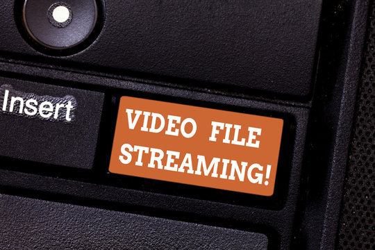 Writing note showing Video File Streaming. Business photo showcasing video be viewed online without being downloaded Keyboard key Intention to create computer message pressing keypad idea