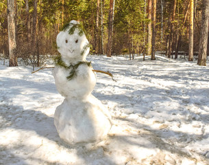 Spring came. Snowman is melting after Christmas. Holiday is over.