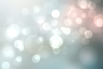 Abstract festive light blue gradient silver bokeh background texture with colorful circles and bokeh lights. Beautiful backdrop with space.