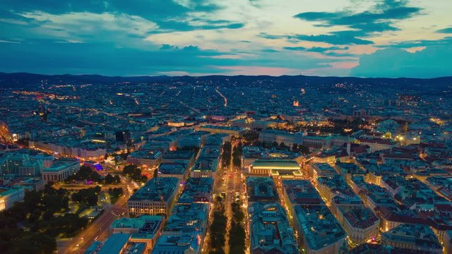 vienna cityscape twilight illuminated central traffic strrets aerial panorama 4k timelapse austria