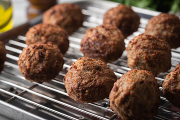 homemade italian meatball image on rustic background