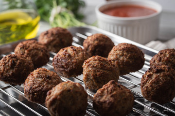 homemade italian meatball image on rustic background