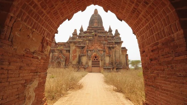 Old Traditional Burmese Temple. Travel Vacation Asian Nature Concept. 4K Slowmotion Steadycam Footage. Bagan, Myanmar.
