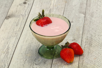 Yoghurt with strawberry in the bowl