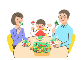 野菜を食べる家族