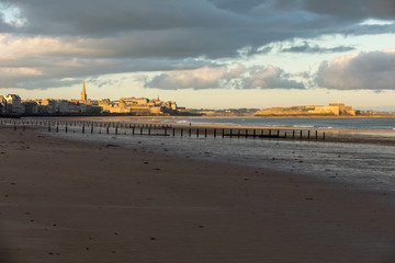 The morning light on the Plage du Sillon and walled city. Saint Malo , France, Ille et Vilaine, Emerald Coast