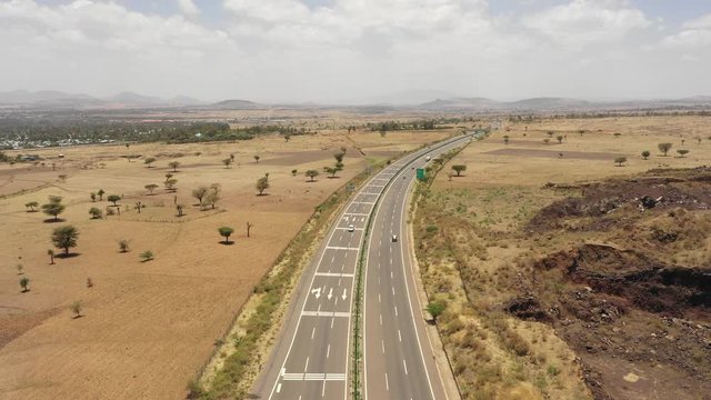 Drone flight of new six lane highway connecting Adama city to Addis Ababa in Ethiopia, road built and partly financed by Chinese corporation