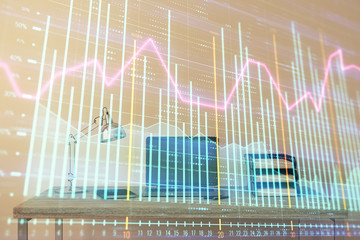 Stock market chart and desktop office computer background. Multi exposure. Concept of financial analysis.