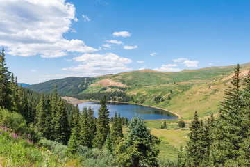 Fototapeta na wymiar Guanella Pass in Colorado high angle view of trees and lake in a valley