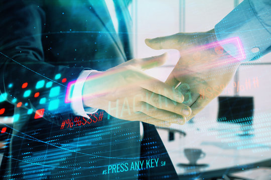 Double exposure of hacking theme hologram on office background with two men handshake. Concept of data security