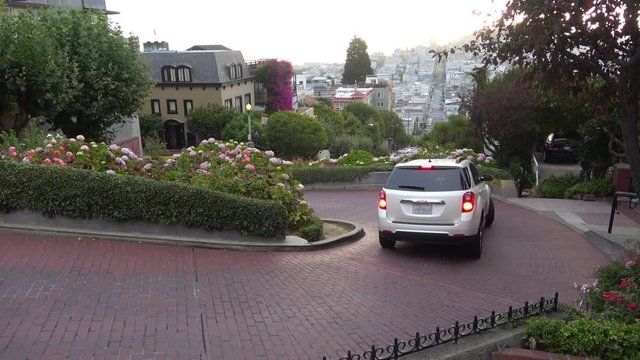 San Francisco Famous Lombard Street. A View down the "crookedest" street in the world -- Lombard Street - the famous tourist destination of San Francisco