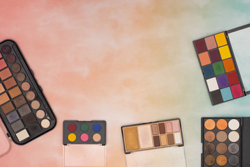 Eye shadow palettes for woman make up on the table 